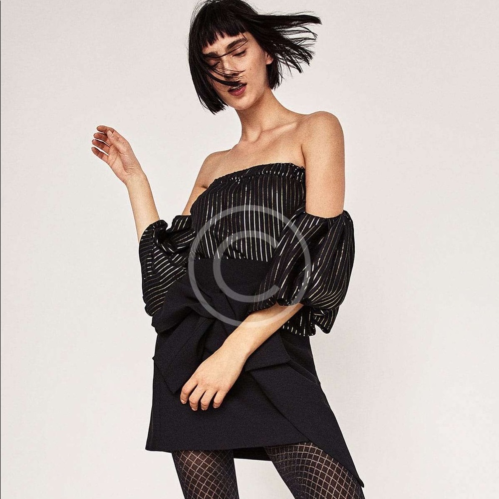 Off the shoulder black and gold top